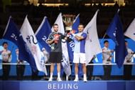 Ivan Dodig and Austin Krajicek with the men's doubles winners' trophy in Beijing